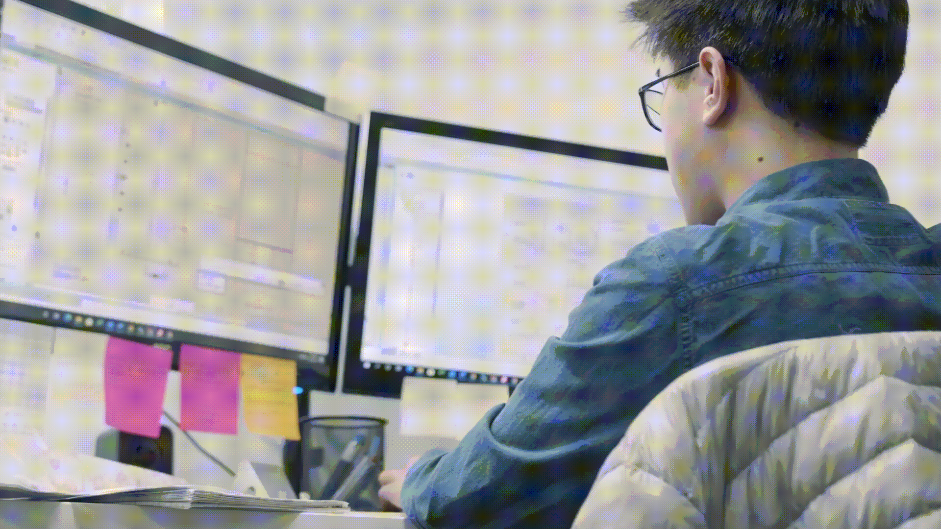Asian man working on computer gif